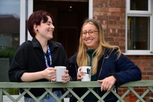 SETTLED-CARE-Lovely-smiling-tea-shot-outside