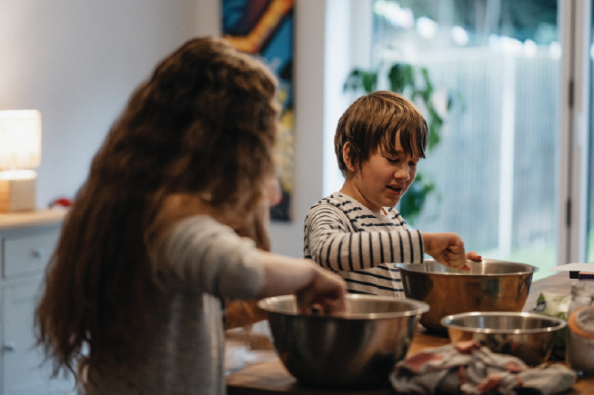 Children in residential care cooking together