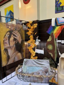 Stall hosting a portrait painting and crafts